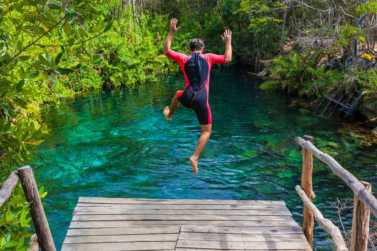 Why Travelers Headed To Cancun Should Visit Cenotes Instead Of The Beach Right Now